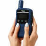 Dark blue TWM Talkie push-to-talk handset held in both hands